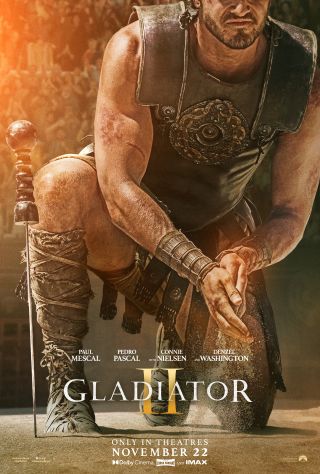 Paul Mescal touches the sand on the teaser poster for Gladiator II.