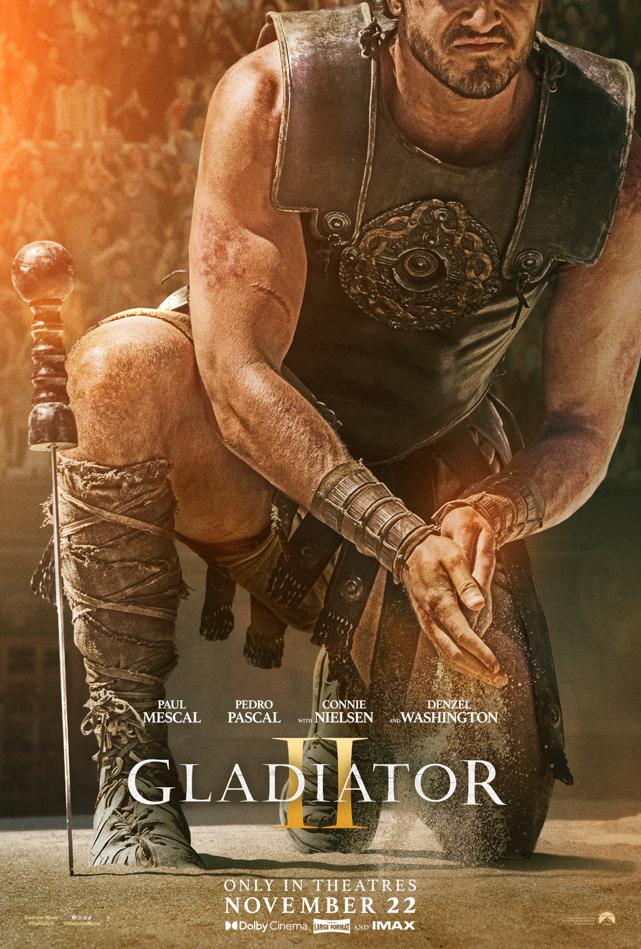 Paul Mescal touches the sand on the teaser poster for Gladiator II.