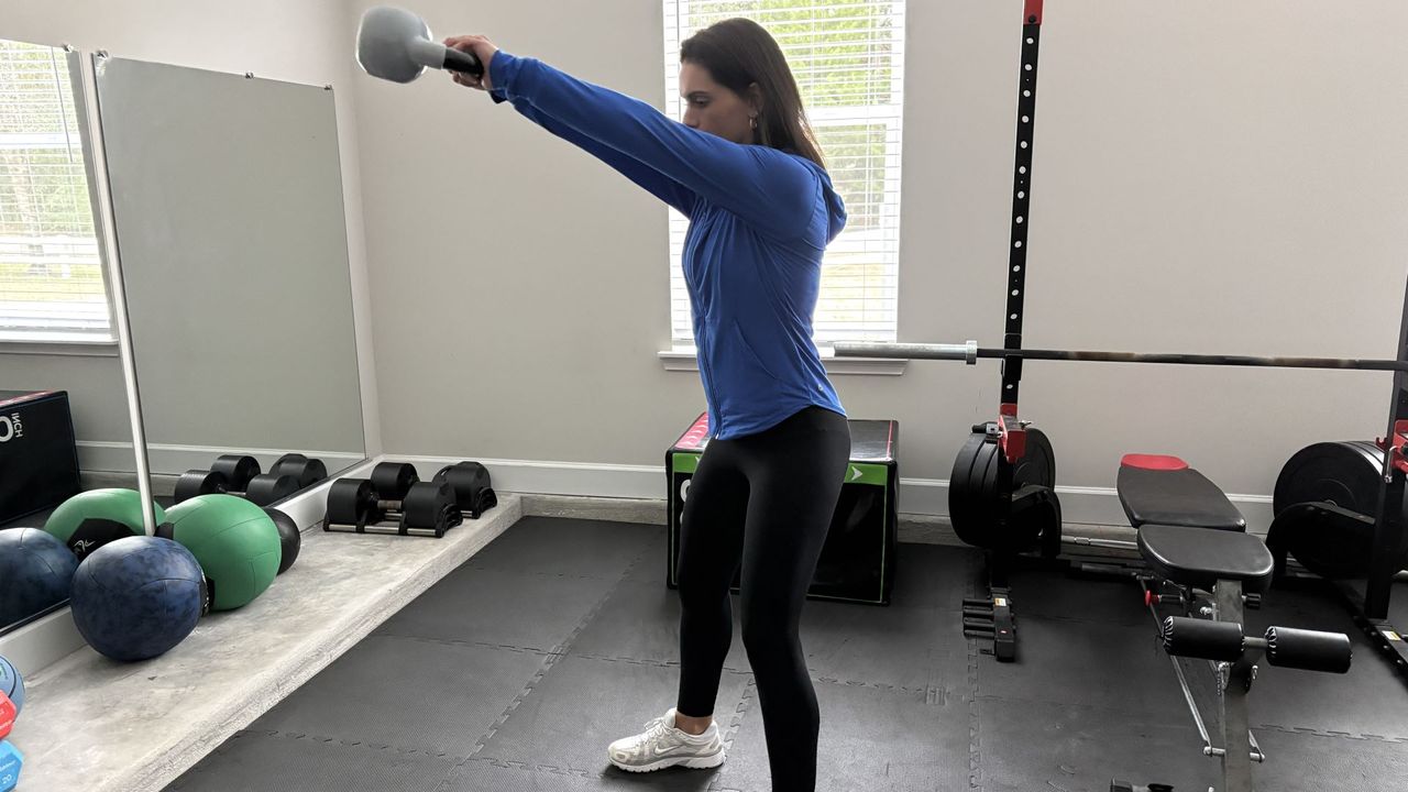 Tami Smith demonstrates a kettlebell swing