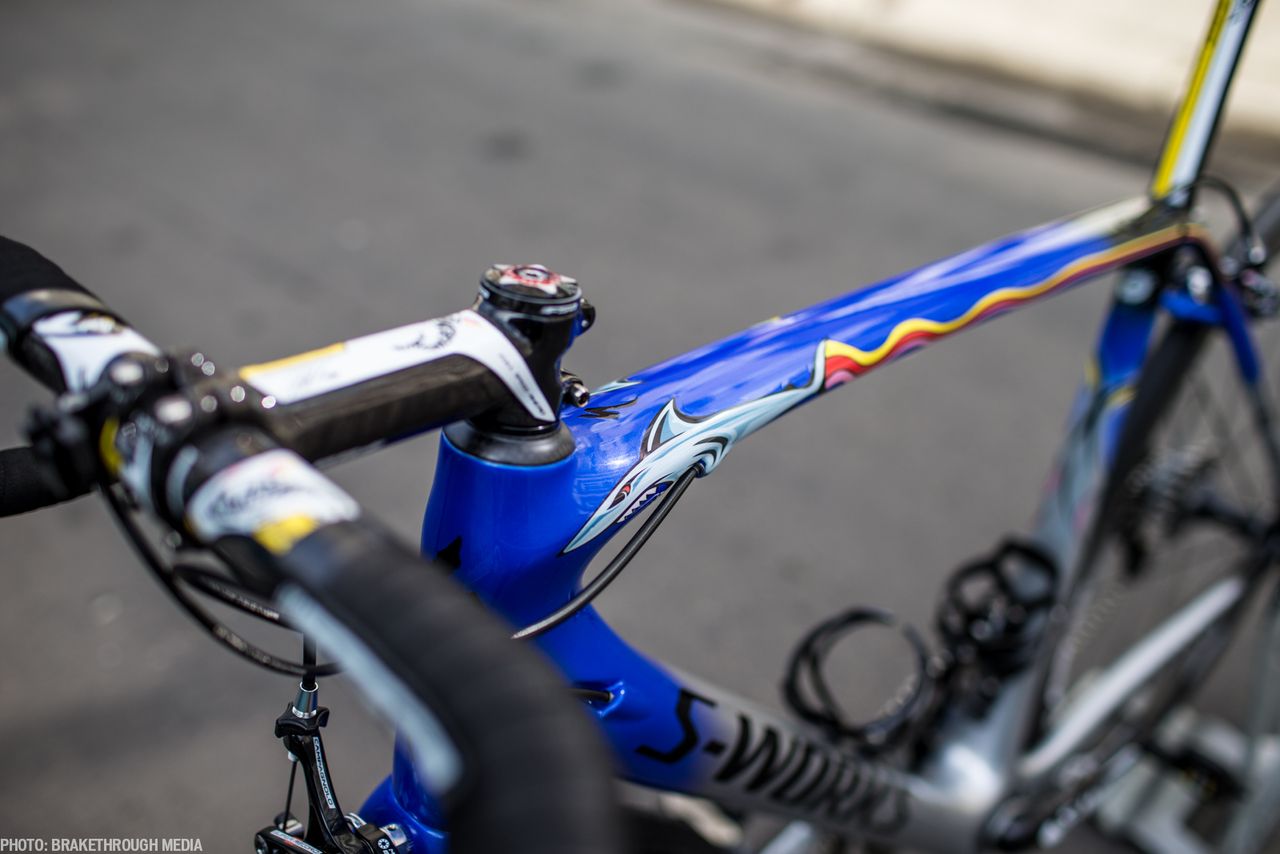 The shark motif is on both sides of the top tube