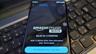 Amazon Music app on an Android phone kept on a keyboard