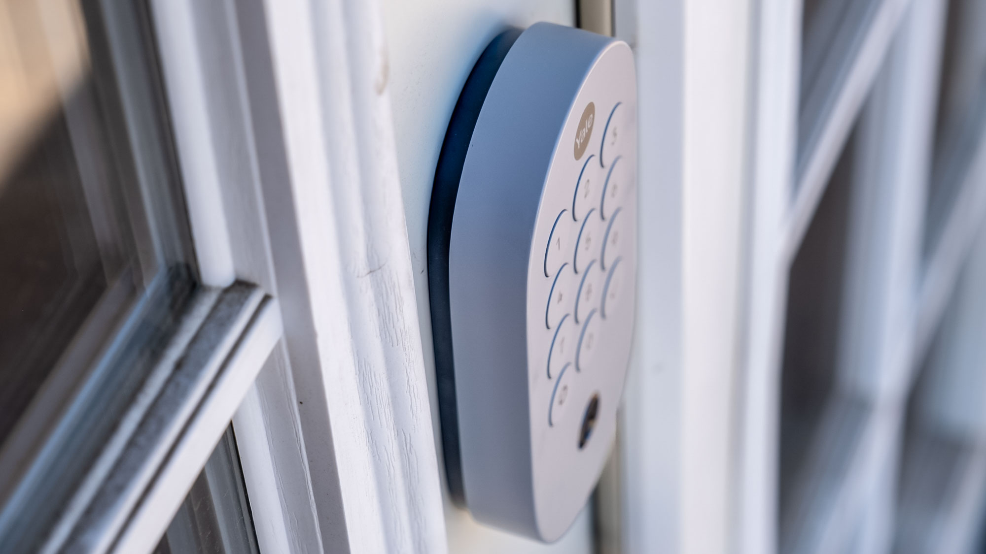 Showing the side and top of a Yale Smart Lock with Matter installed on an exterior door
