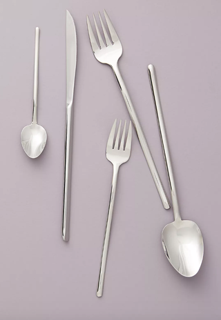 five pieces of silver cutlery