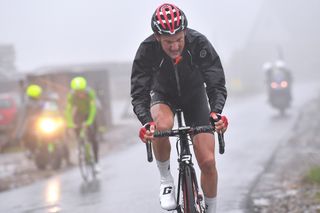 Lotto-Soudal's Tim Wellens forges ahead in the bad weather which saw almost half of the peloton abandon