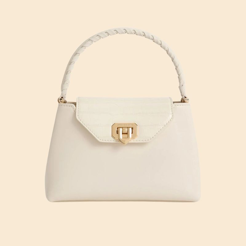 Image of white handle top bag