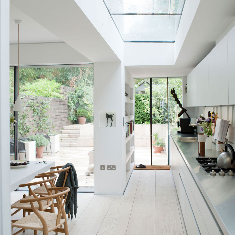 Open plan kitchen with glass extension