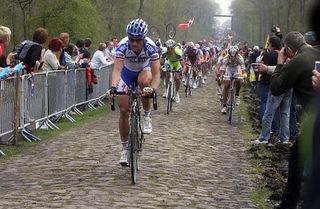 Tom Boonen leads in the Forest of Arenberg sector in Paris-Roubaix