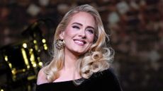  Adele smiles as she performs onstage during the "Weekends with Adele" Residency Opening at The Colosseum at Caesars Palace on November 18, 2022 in Las Vegas, Nevada. 