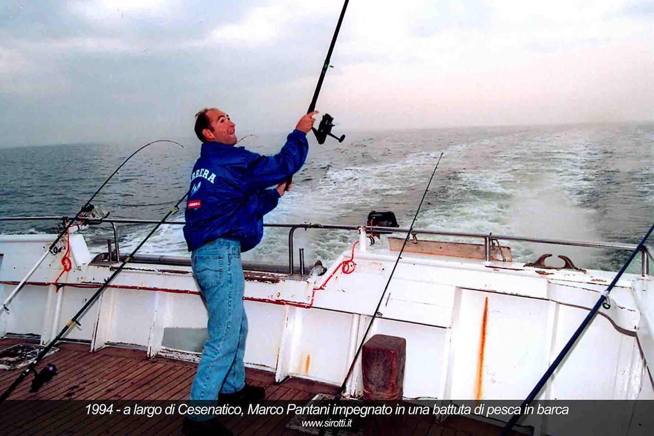 Marco Pantani enjoys a fishing trip during the 1994 winter