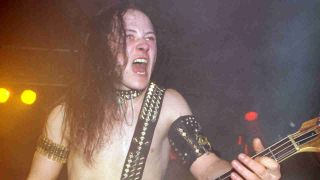 Venom frontman Cronos playing live onstage in 1983