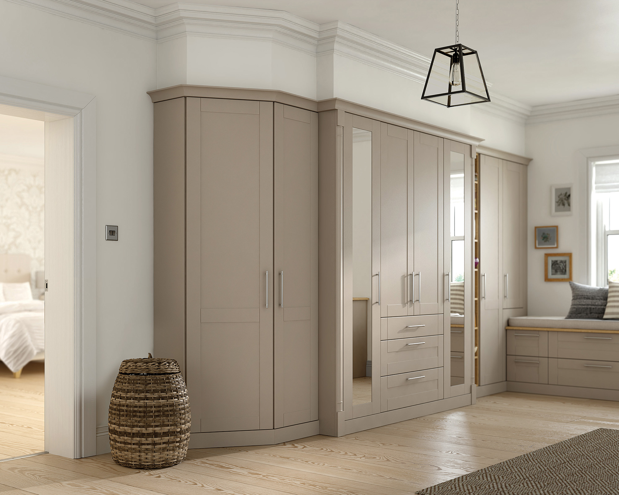 A Daval taupe colored wardrobe with window seat on mezzanine with bedroom in background