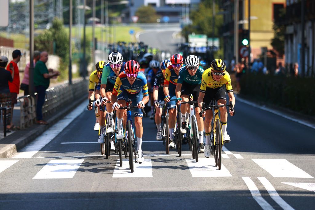 SAN SEBASTIAN SPAIN AUGUST 10 LR Alex Baudin of France and Decathlon AG2R La Mondiale Team Juan Pedro Lopez of Spain and Team Lidl Trek and Sepp Kuss of The United States and Team Visma Lease a Bike lead the peloton during the 44th Donostia San Sebastian Klasikoa 2024 a 236km one day race from San Sebastian to San Sebastian UCIWT on August 10 2024 in San Sebastian Spain Photo by Gonzalo Arroyo MorenoGetty Images