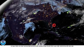 Satellite image of the continental U.S. with a red circle drawn near the Florida coast, indicating the location of a fireball that crossed the sky off the east coast 