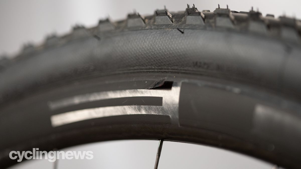 HED Emporia GC3 Pro gravel wheelset detail of pealing vinyl