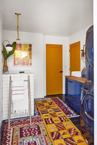 utility room with blue appliances