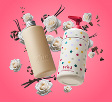 The Wild Natural Refillable Hand Wash set pictured on a bright pink background 
