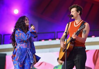 Camilla Cabello and Shawn Mendes performing onstage together