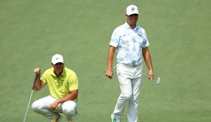 Koepka and Woodland line up their putts