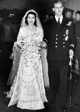 Queen Elizabeth II, Princess Elizabeth marries Prince Philip 20th November - 1947. The happy couple leave Westminster Abbey