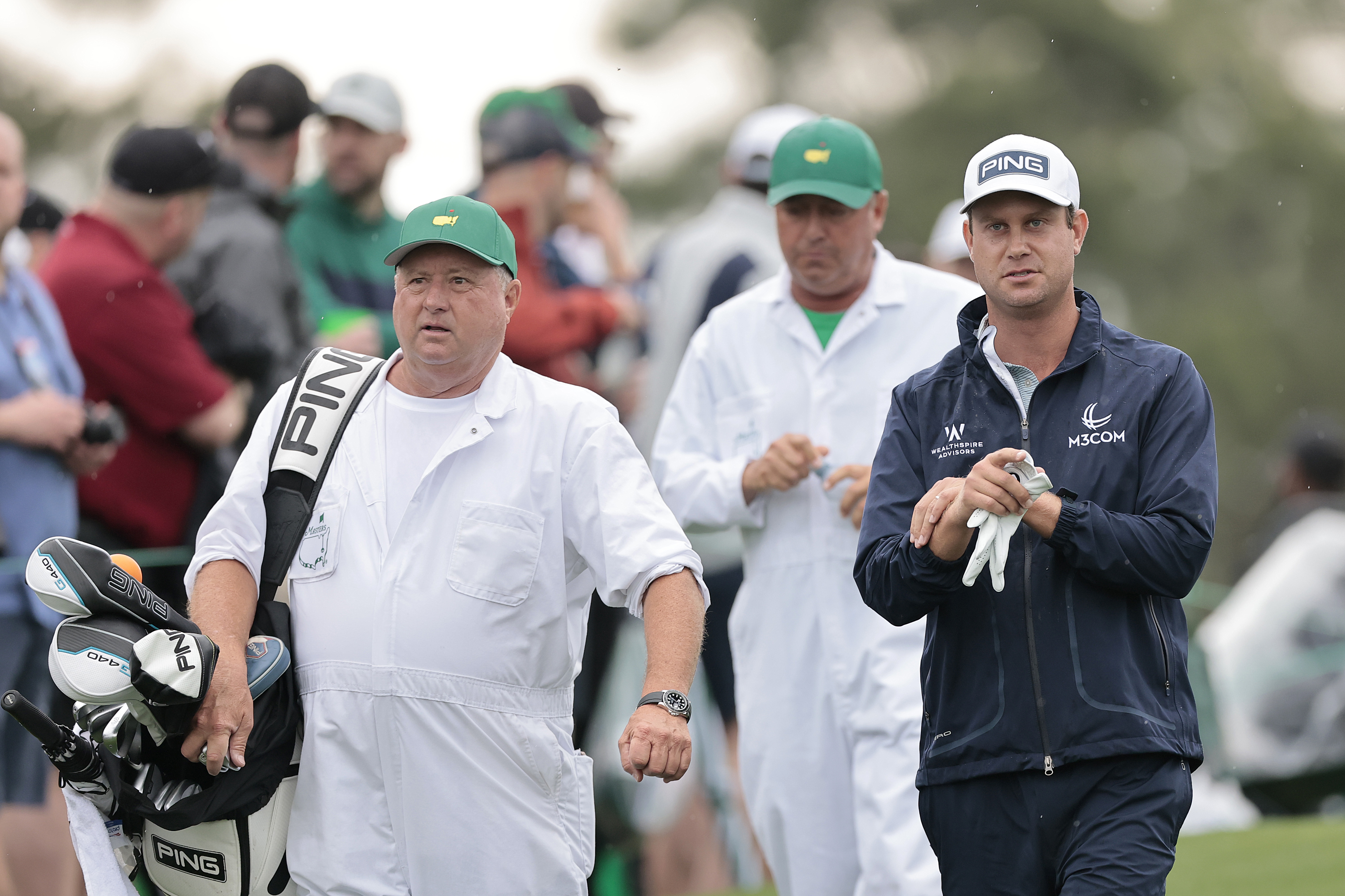 Eric Larson (left) and Harris English walk along during the 2025 Masters Tournament