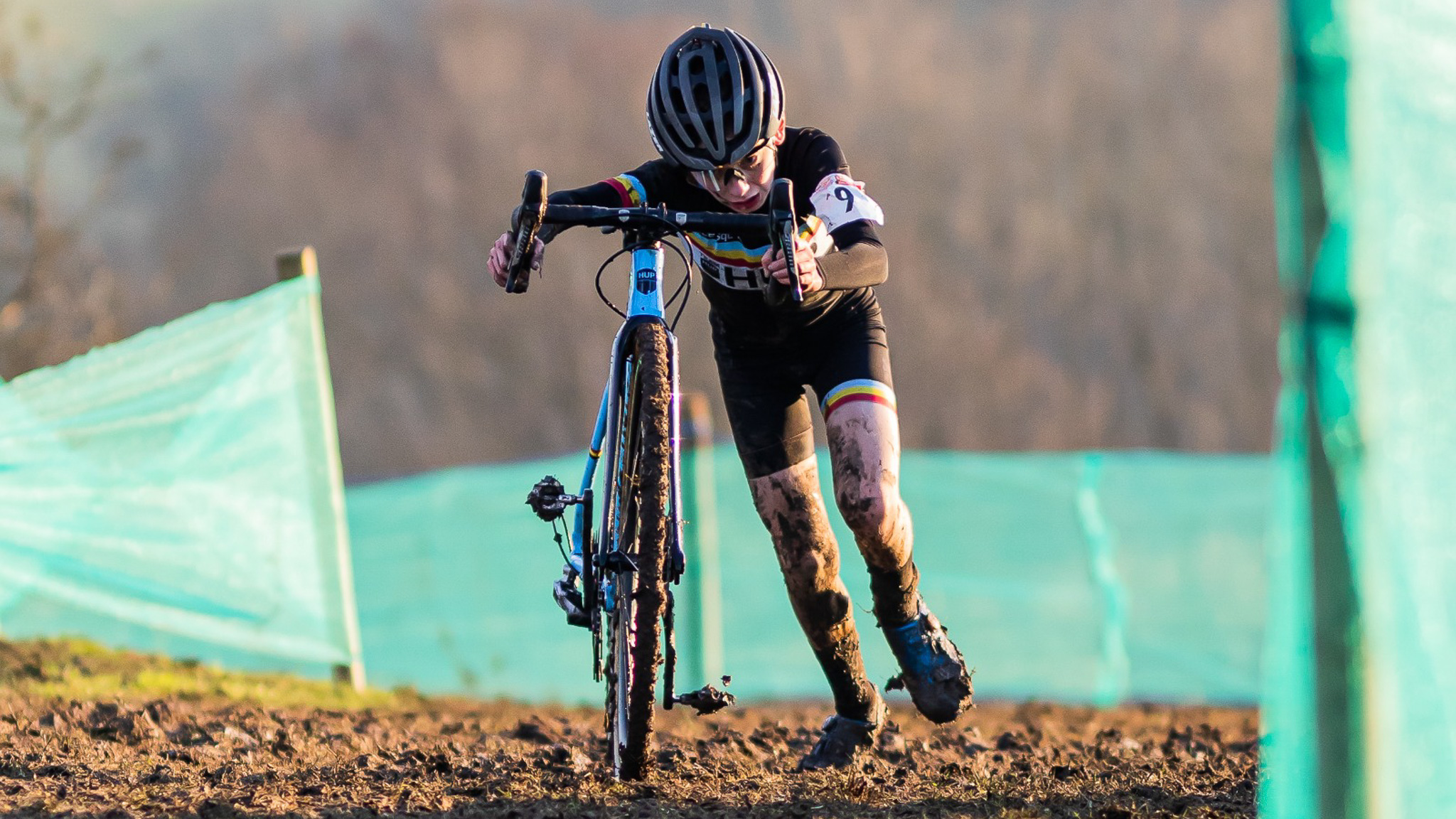 Child racing in a cyclocross race