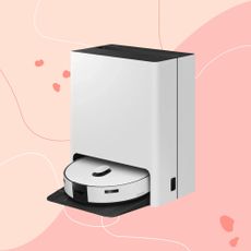 Samsung Bespoke Jet Bot Combo AI+ 3-in-1 Robot Vacuum Cleaner on a pink background