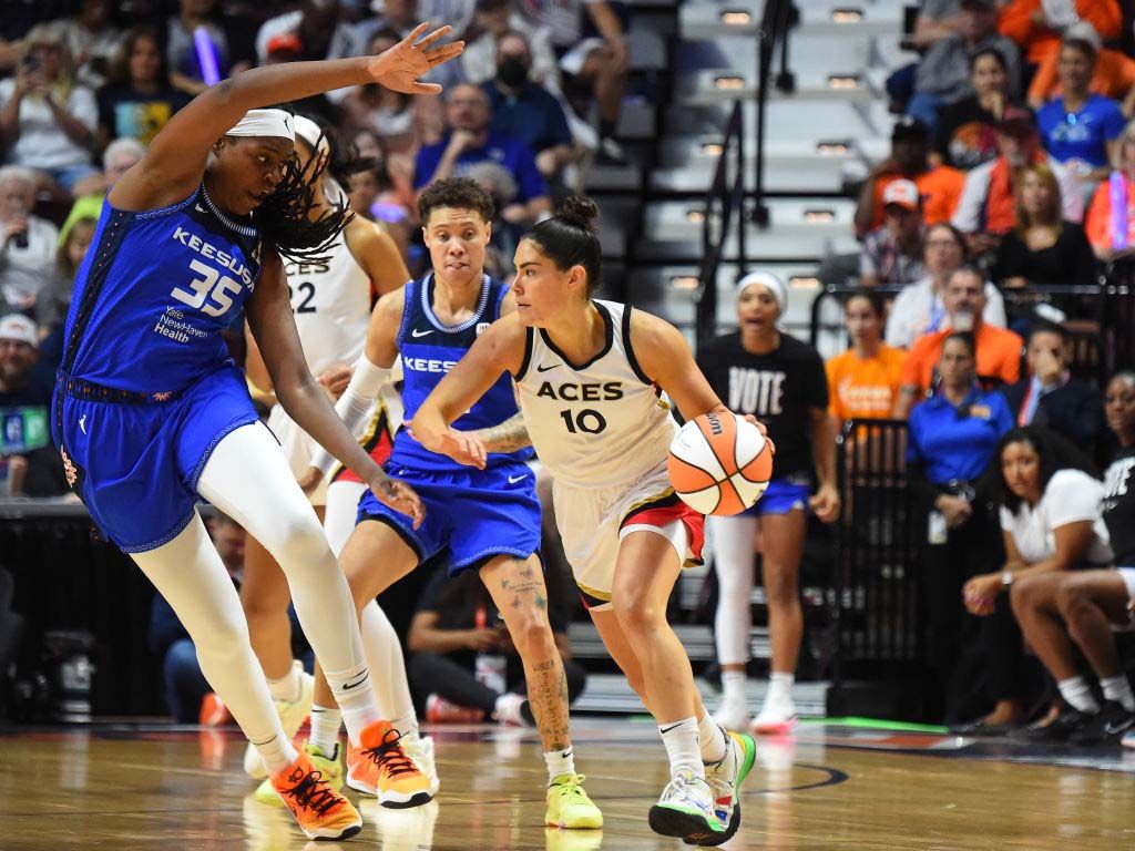 Kelsey Plum of the Las Vegas Aces dribbles the ball during the game against the Connecticut Sun during Game 4 of the 2022 WNBA Finals on September 18, 2022 