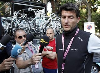 Leopard Trek's Luca Guercilena talks to the press