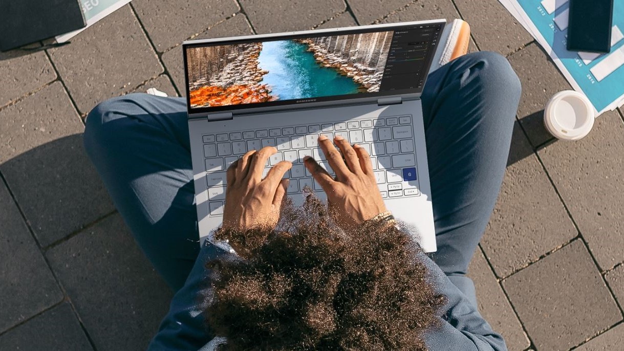 Person using Galaxy Book laptop