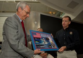 STS-135 Commander Chris Ferguson Presents Montage to Make Shara, Curator, Department of Astrophysics, American Museum of Natural History