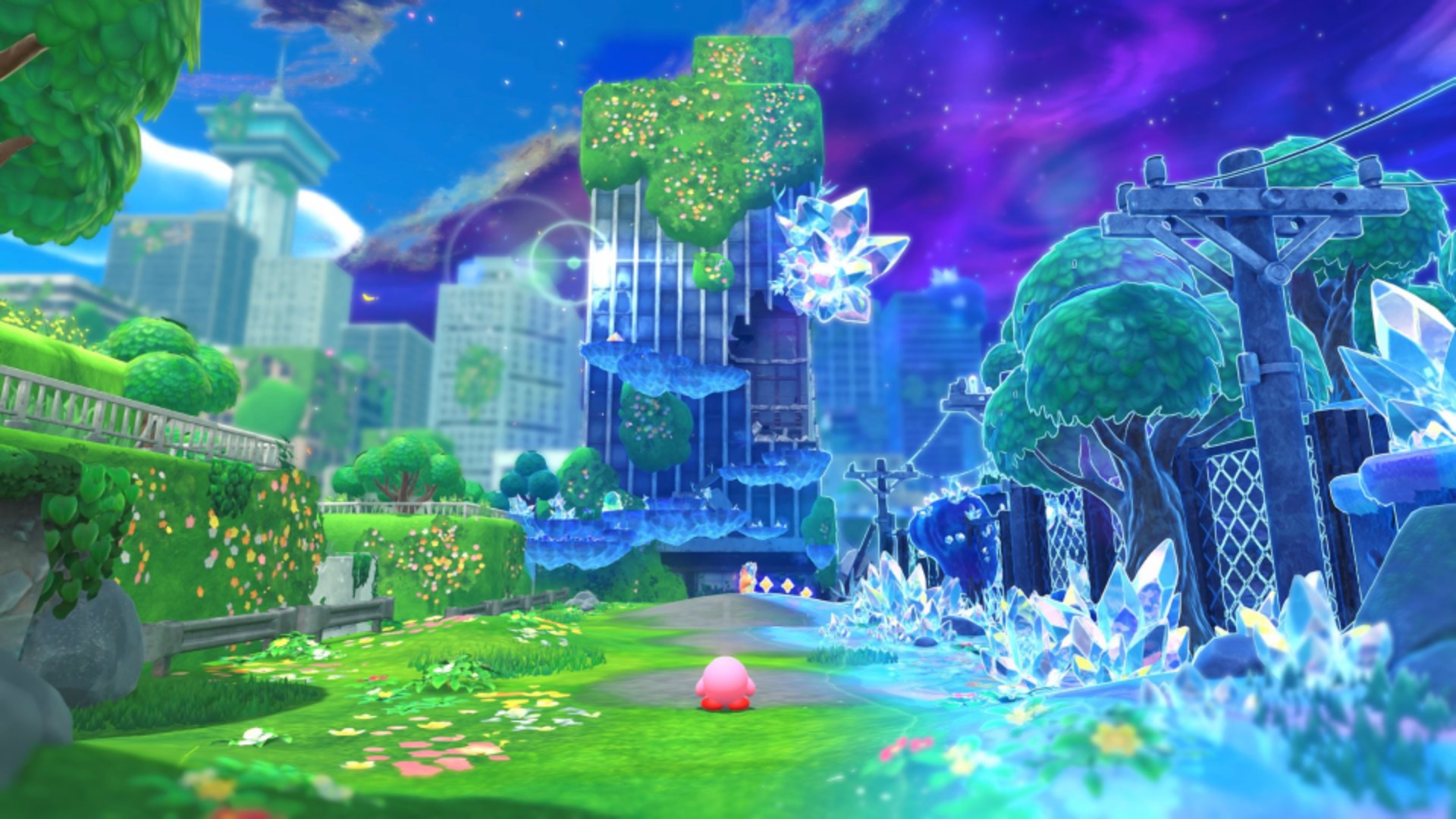 Kirby and the Forgotten Land Star-Crossed World screenshot showing Kirby in a city-scape stage, with one half of it covered in crystal