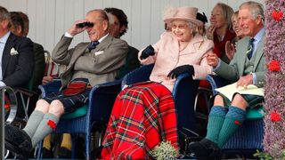 Prince Philip, Duke of Edinburgh, Queen Elizabeth II and Prince Charles, Prince of Wales attend the annual Braemar Highland Games at The Princess Royal and Duke of Fife Memorial Park on September 7, 2013 in Braemar, Scotland
