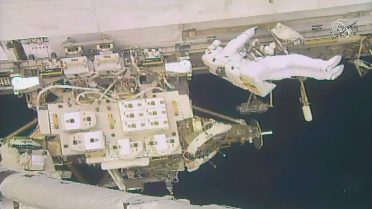 NASA astronaut Nick Hague works on his "get-ahead" task at the end of today's spacewalk.
