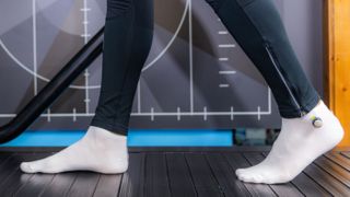 Supination vs pronation: Image shows person's feet on treadmill
