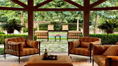 backyard ideas with pavers: covered patio with wooden pergola