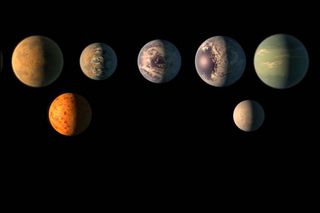 This artist's rendition imagines what the seven planets of the TRAPPIST-1 system might look like.