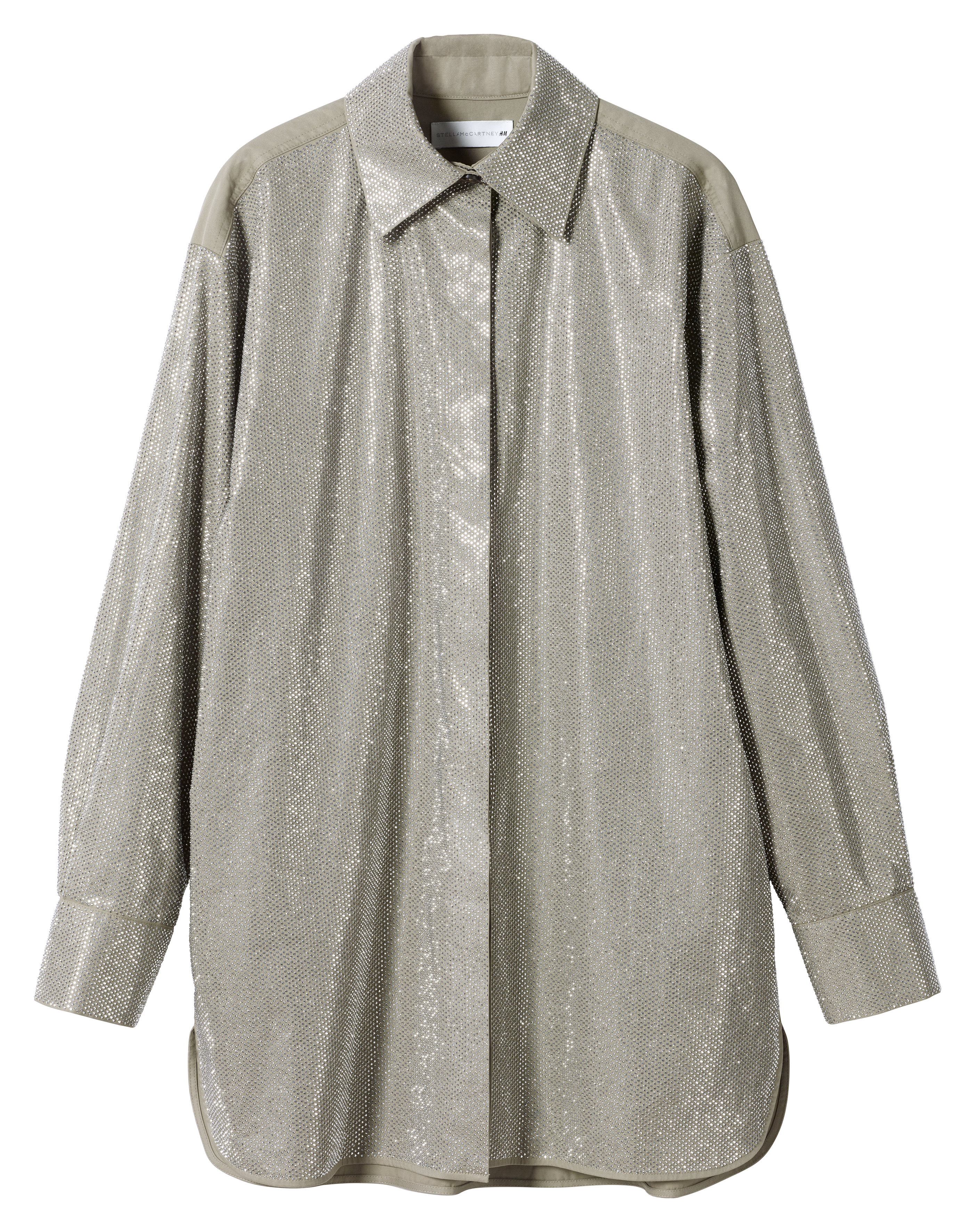 clothes from the H&M x Stella McCartney collaboration on a plain backdrop