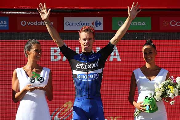Gianni Meersman (Etixx-QuickStep) celebrates on the podium.