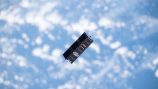 A small satellite deployed from the International Space Station.