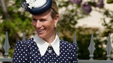 a headshot of Zara Tindall wearing a polka dot dress