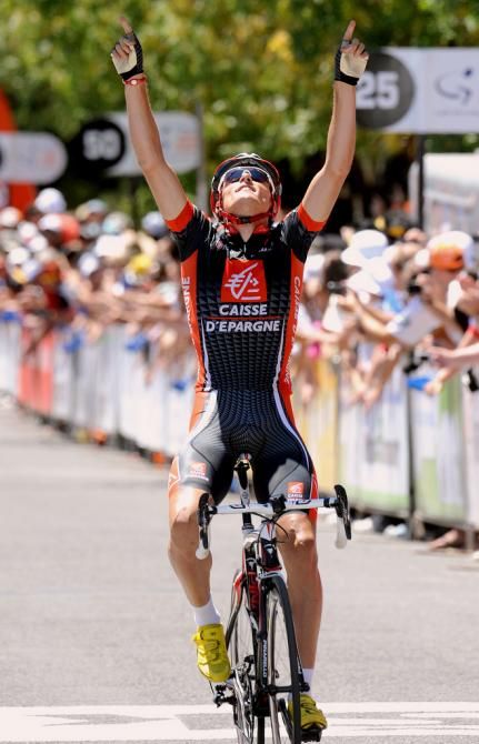 Luis Leon Sanchez wins the stage and points to the sky
