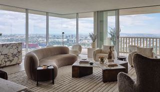 A minimalist living room with mushroom grey tones
