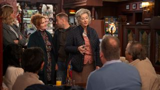 Evelyn Plummer holds a drink and says goodbye at the Rovers in Coronation Street.