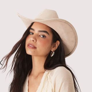 Image of woman wearing cowboy hat