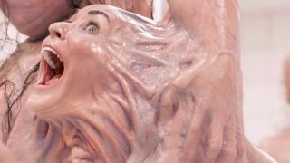 The horrifying reveal of Demi Moore's face buried in the grotesque flesh of Monstro Elisa-Sue, The Substance.