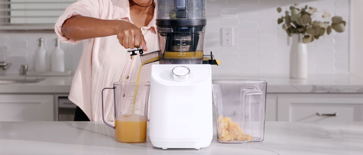 A Nama C2 cold press blender on a kitchen countertop.