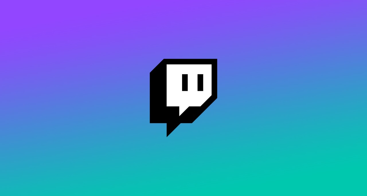 The Twitch logo against a purple, green and blue background