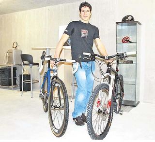Christof Bischof with two new bikes that are part of his Bischibikes line.