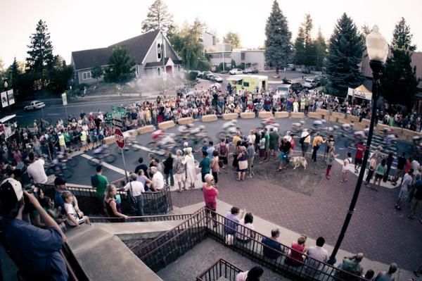 Crowds line the final turn of the course.