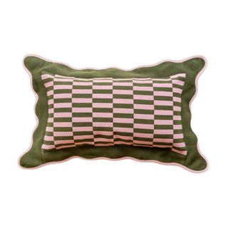 A pillow with a wide check and frill